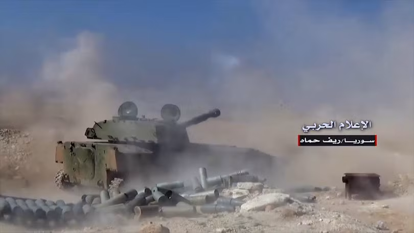 Pháo binh quân đội Syria bắn phá chiến tuyến cuối cùng của IS. ảnh minh họa video Hezbollah