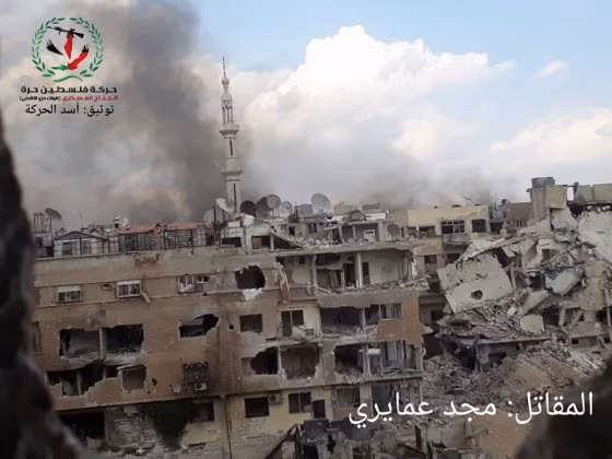 Một khu phố thuộc quận Trại tị nạn Yarmouk vừa giải phóng, ảnh binh sĩ quân tình nguyện Palestine