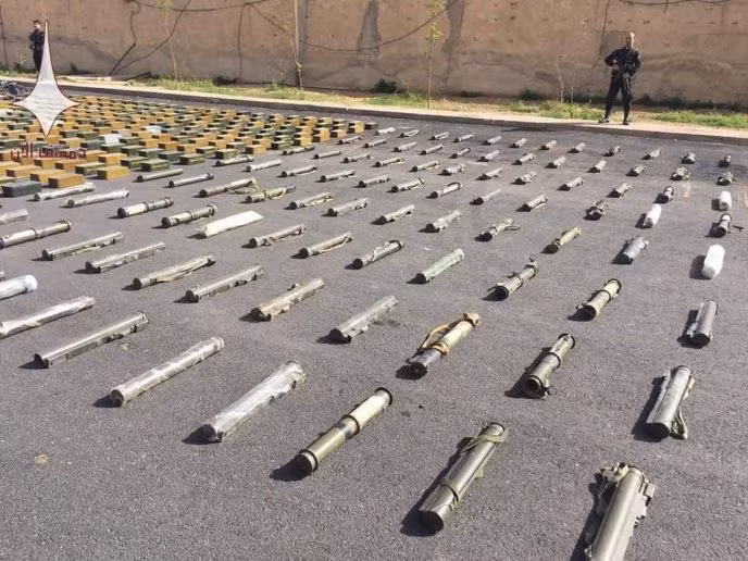 Quân đội Syria chiếm giữ lượng vũ khí lớn chuyển vào tử địa Đông Ghouta ảnh 3