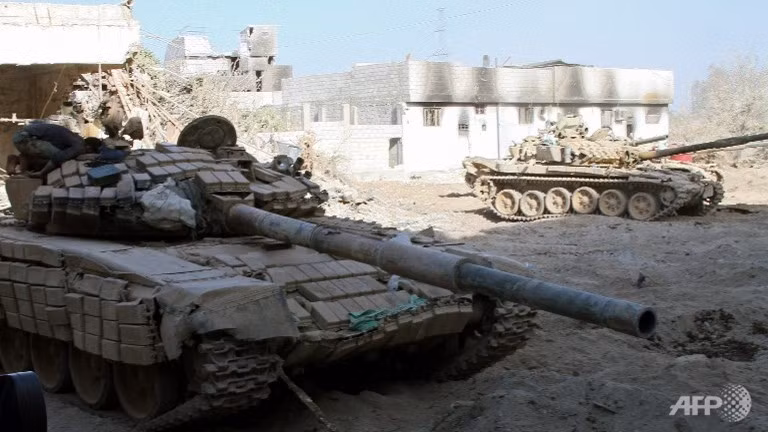 Xe tăng quân đội Syria tiến công trên chiến trường Đông Ghouta - ảnh Muraselon