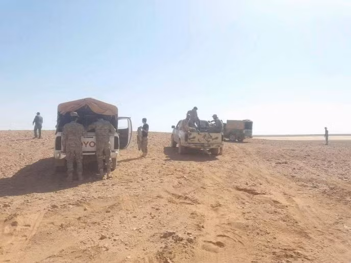 Quân đội Syria chiến đấu trên chiến trường hoang mạc Sweida. Ảnh Masdar News