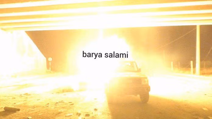 Xe ô tô quân đội Syria tiến lên cầu Ramouseh
