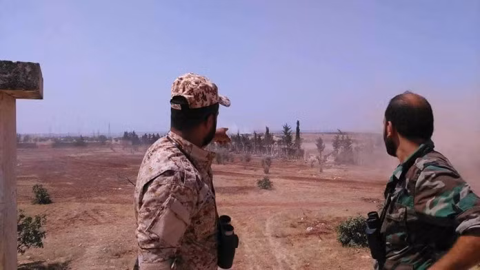 Các sĩ quan Syria trên chiến trường khu trang trại miền Nam Al-Mallah