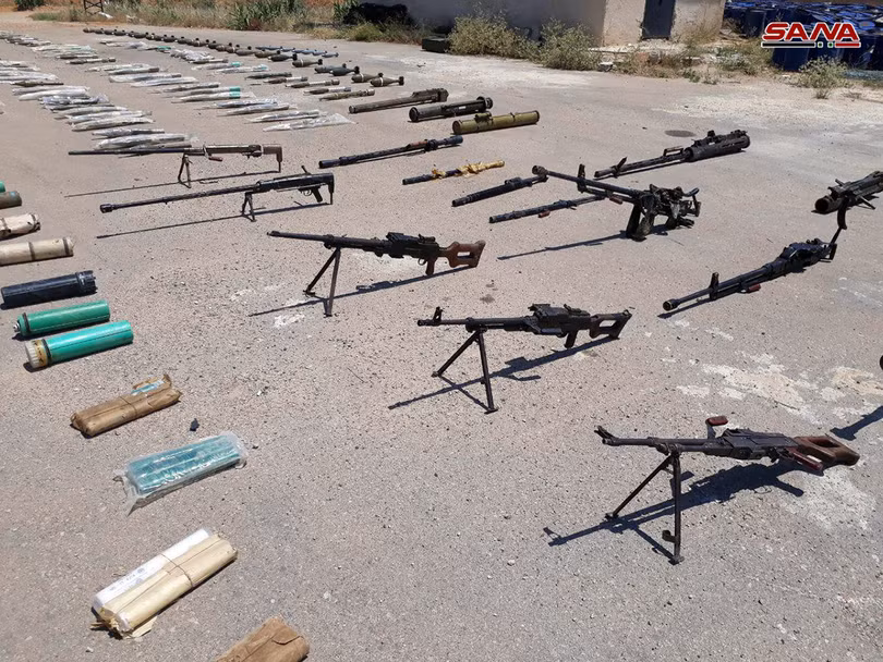 Quân đội Syria thu giữ vũ khí vận chuyển phi pháp trên địa phận tỉnh Idlib. Ảnh SANA Quân đội Syria thu giữ vũ khí vận chuyển phi pháp trên địa phận tỉnh Idlib. Ảnh SANA