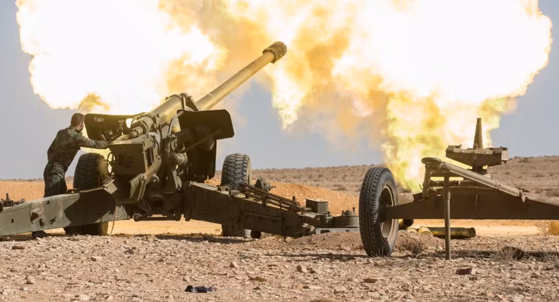 Pháo binh - tên lửa quân đội Syria đánh phá dữ dội chiến tuyến của lực lượng Hồi giáo cực đoan trên khu phi quân sự. Ảnh minh họa: Masdar News.