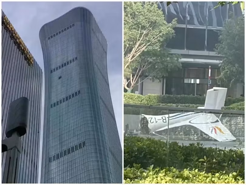 Tòa nhà CITIC Tower bị chiếc máy bay đâm va và phần đuôi chiếc máy bay rơi xuống. Ảnh: HK01.