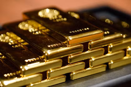Giá vàng thế giới sáng 1/10 giảm xuống 4.154 USD/ounce, thấp hơn khoảng 19 USD/ounce so với sáng 30/9. Ảnh: Bloomberg.