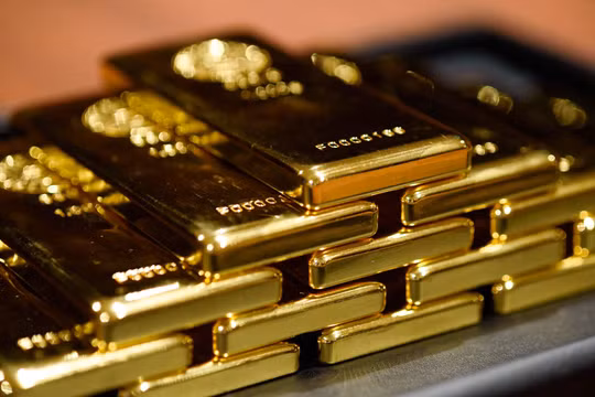 Giá vàng thế giới sáng 1/10 giảm xuống 4.154 USD/ounce, thấp hơn khoảng 19 USD/ounce so với sáng 30/9. Ảnh: Bloomberg.