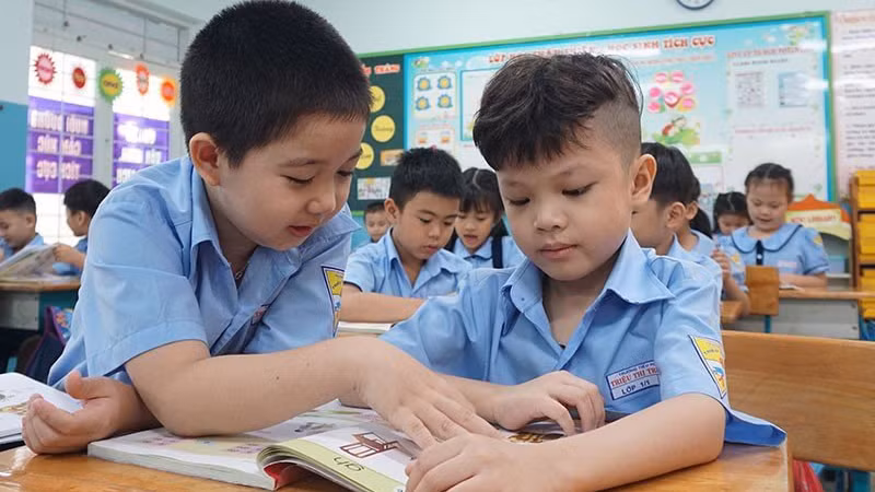 Học sinh Trường Tiểu học Triệu Thị Trinh, quận 10 trong một tiết học. Ảnh: Nguyễn Quyên