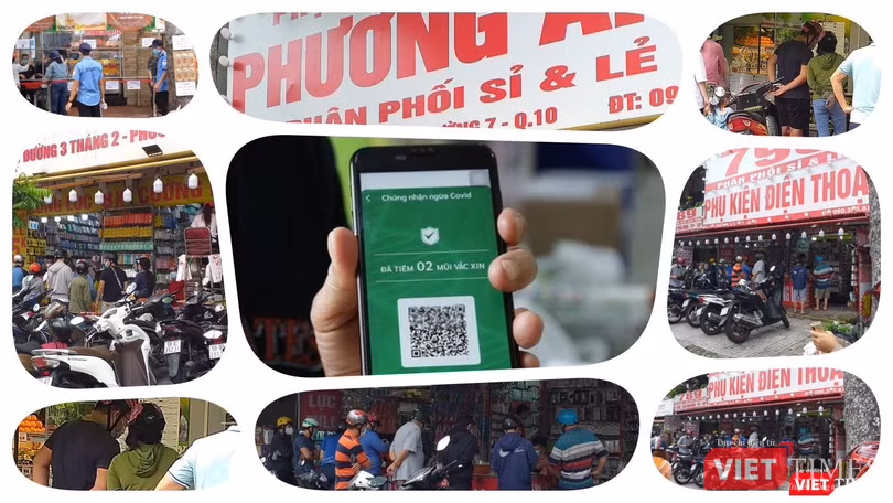 Nhiều hàng dài người dân đứng trước các cửa hàng bán lẻ trên nhiều tuyến phố như thế này, dù đã tiêm đủ 2 mũi vaccine thì vẫn tiềm ẩn nguy cơ. Ảnh: Hoà Bình Nhiều hàng dài người dân đứng trước các cửa hàng bán lẻ trên nhiều tuyến phố như thế này, dù đã tiêm đủ 2 mũi vaccine thì vẫn tiềm ẩn nguy cơ. Ảnh: Hoà Bình