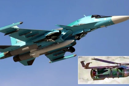 Máy bay Su-34 và bom lượn FAB-3000 đang bay. Ảnh: MW.