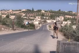 Lực lượng dân quân người Kurd truy quét phần tử đối lập và thân IS ở Kobani. Ảnh minh họa Masdar News.
