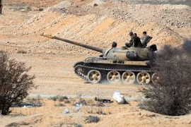 Xe tăng quân đội Syria tiến công trên vùng sa mạc phía đông tỉnh Hama - ảnh minh họa Masdar News