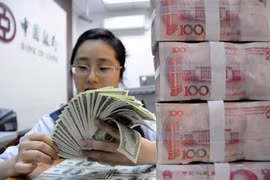 Đằng sau động thái hạ giá đồng nhân dân tệ