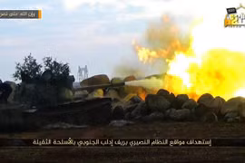 Xe tăng của nhóm thánh chiến Duy Ngô Nhĩ tấn công quân đội Syria ở Idlib. Ảnh truyền thông đối lập Syria