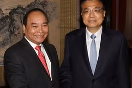 Phó Thủ tướng Nguyễn Xuân Phúc và Thủ tướng Trung Quốc Lý Khắc Cường
