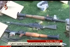 Quân đội Syria thu giữ kho vũ khí của IS ở Daraa. Ảnh minh họa kênh truyền hình Al-Ikhbariya