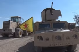 Lực lượng YPG, YPJ hành quân về Afrin chiến đấu chống Thổ Nhĩ Kỳ - ảnh minh họa Masdar News