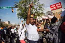 Quang cảnh cuộc tuần hành ở Baltimore ngày 30/4. Ảnh: AFP/TTXVN