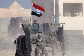 Binh sĩ quân đội Iraq trong một khu dân cư gần biên giới với Syria, chuẩn bị cho cuộc tấn công mới - ảnh minh họa Masdar News