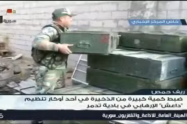 Kho vũ khí thu được của IS trên chiến trường khu vực Palmyra - Homs - ảnh minh họa video SANA