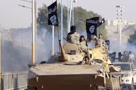 Xe thiết giáp của IS tiến công vào chiến tuyến của quân đội Syria - ảnh minh hỏa Masdar News