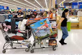 Wal-Mart có hơn 10.400 siêu thị ở 27 quốc gia (năm 2011) với hơn 2,2 triệu nhân viên, phục vụ hơn 200 triệu lượt khách mỗi tuần - Ảnh: Getty Images