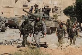 Binh sĩ quân đội Syria trên chiến trường ngoại ô Damasus - ảnh minh họa Masdar News