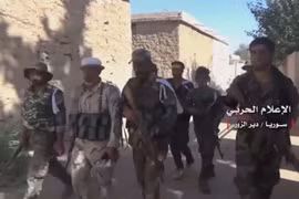 Binh sĩ quân đội Syria trong thị trấn Hatlah Fouqani vừa giải phóng - ảnh minh họa Masdar News