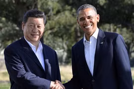 Tổng thống Mỹ Barack Obama (phải) và Chủ tịch Trung Quốc Tập Cận Bình.