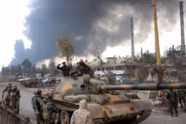 Hồi giáo cực đoan phối hợp với quân đội Syria tấn công IS