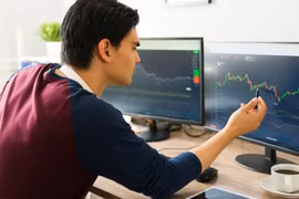 Hàng trăm triệu người đã đầu tư vào tiền mã hoá (Ảnh: CNBC)