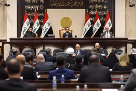 Các thành viên Quốc hội Iraq thông qua nghị quyết chấm dứt sự hiện diện của binh sĩ nước ngoài trên lãnh thổ nước này (Ảnh: Reuters)