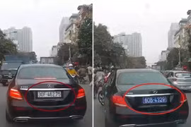 Chiếc xe ô tô bất ngờ đổi biển số trên đường đang gây xôn xao dư luận (ảnh: cắt từ clip)