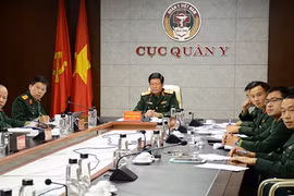 Thiếu tướng, PGS.TS Nguyễn Xuân Kiên cùng các thành viên Đoàn Việt Nam tại điểm cầu Hà Nội. Ảnh: Báo QĐND