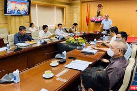 Quang cảnh hội nghịtập huấn hướng dẫn chẩn đoán, điều trị, phục hồi chức năng và tự chăm sóc một số bệnh hậu COVID-19 cho cán bộ y tế do Bộ Y tế tổ chức