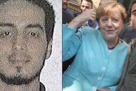 Bà Merkel chụp với người được cho là chiến binh đánh bom tự sát 