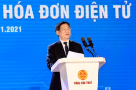 Bộ trưởng Hồ Đức Phớc phát biểu tại hội nghị về hóa đơn điện tử (Ảnh: Bộ Tài chính)