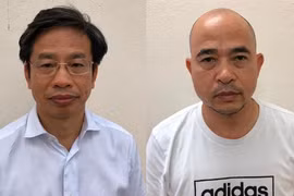 Ông Nguyễn Xuân Sơn (đeo kính) và Vũ Trọng Hải - Ảnh: bocongan.gov.vn