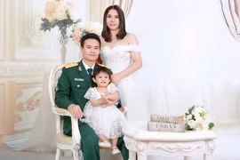Gia đình Thượng úy Đậu Văn Dũng, chị Phạm Thị Ngọc và con gái Đậu Hà Lan (Ảnh - BVCC)