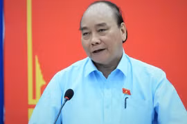 Chủ tịch nước Nguyễn Xuân Phúc tại Hội nghị tiếp xúc trực tuyến giữa tổ đại biểu Quốc hội TP.HCM với cử tri huyện Củ Chi và huyện Hóc Môn. Ảnh: Sỹ Đông