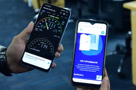 Tên mạng 5G Private của QuadGen (QG5G) hiển thị trên điện thoại thương mại.