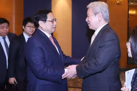 Thủ tướng Phạm Minh Chính và Chủ tịch JICA Tanaka Akihiko tại buổi gặp hôm nay - 18/12, ở Tokyo (Nhật Bản).