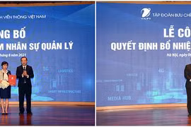 Chủ tịch VNPT Phạm Đức Long trao quyết định cho 2 phó Tổng GĐ Tập đoàn. Ảnh VNPT