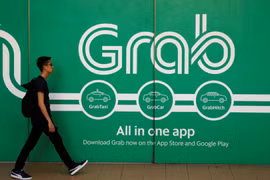 Thêm 2 quốc gia giám sát việc Uber sáp nhập Grab (ảnh: CBS News)