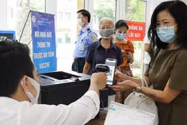 Bộ Công an đang triển khai thí điểm Hệ thống quản lý tiêm chủng vaccine. Ảnh: VGP
