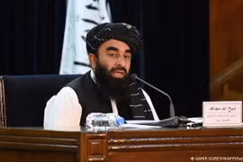 Ngày 7/9, người phát ngôn Taliban Mujahid hôm 7/9 thông báo danh sách "chính phủ lâm thời" của Afghanistan (Ảnh: Deutsche Welle).