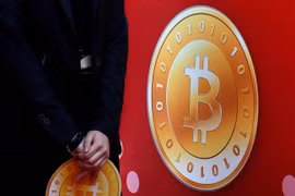 Ở thời điểm hiện tại, những đồng Bitcoin có giá trị hàng nghìn USD (Ảnh: Business Insider)