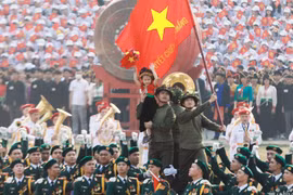 Hình ảnh em bé Điện Biên tươi cười gây xôn xao mạng xã hội. Ảnh: VietNamNet.