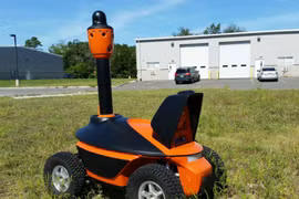 Robot an ninh tại Singapore. Ảnh: Smprobotics US